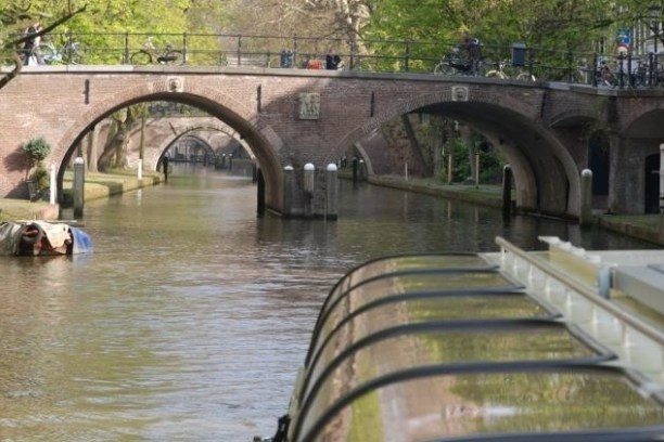 a bridge over a river in a pool of water