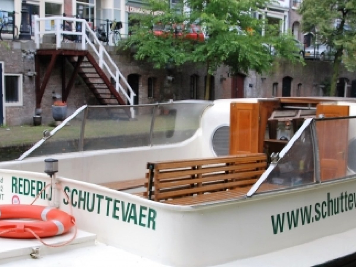 a boat sitting on top of a building
