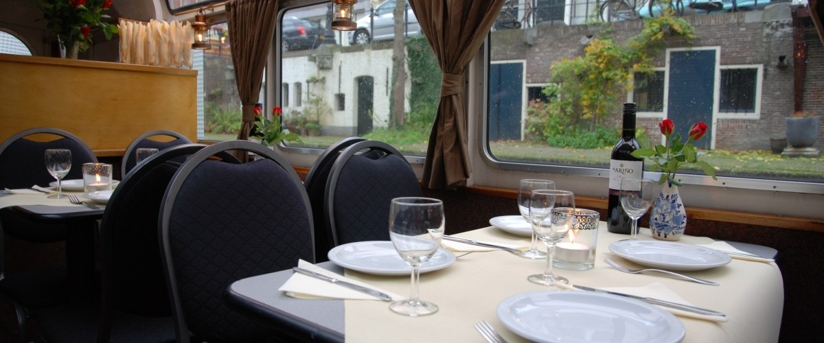 a glass of wine on a table