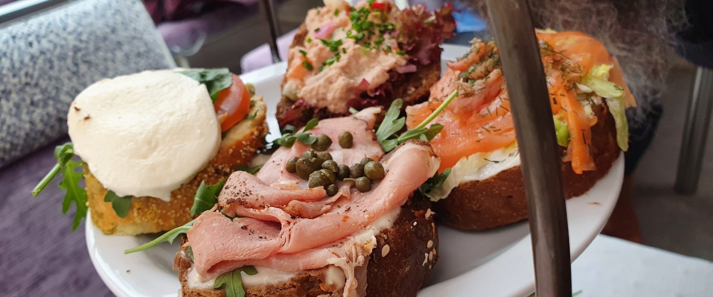 a sandwich cut in half on a plate