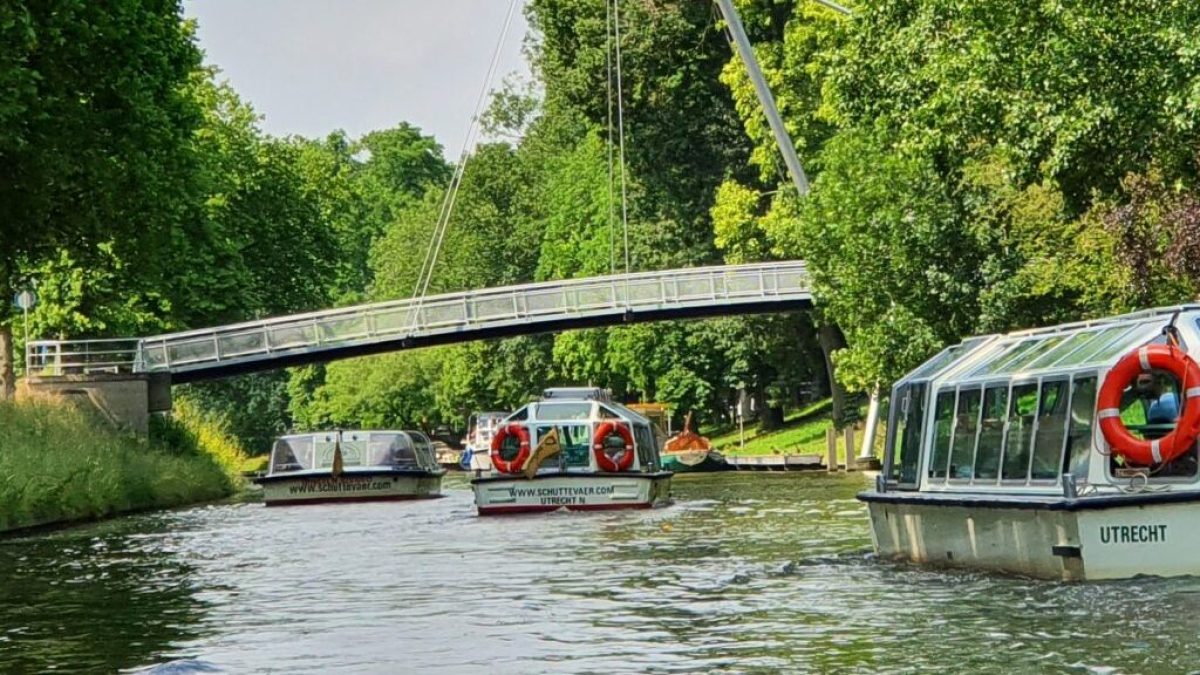 a boat traveling down a river