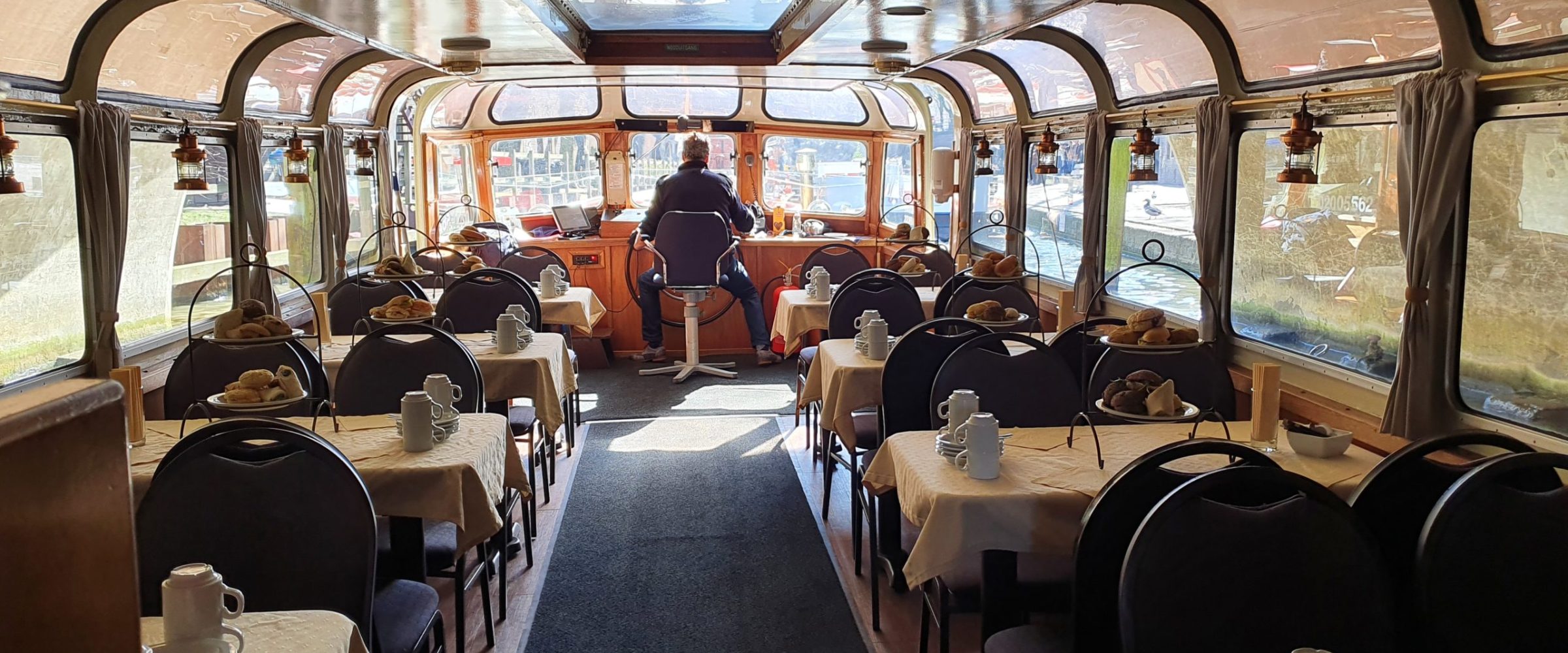 a room filled with furniture and a large window