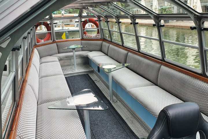 a train is parked on the side of a building