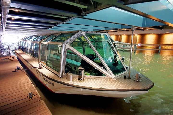 a boat sitting on top of a wooden table