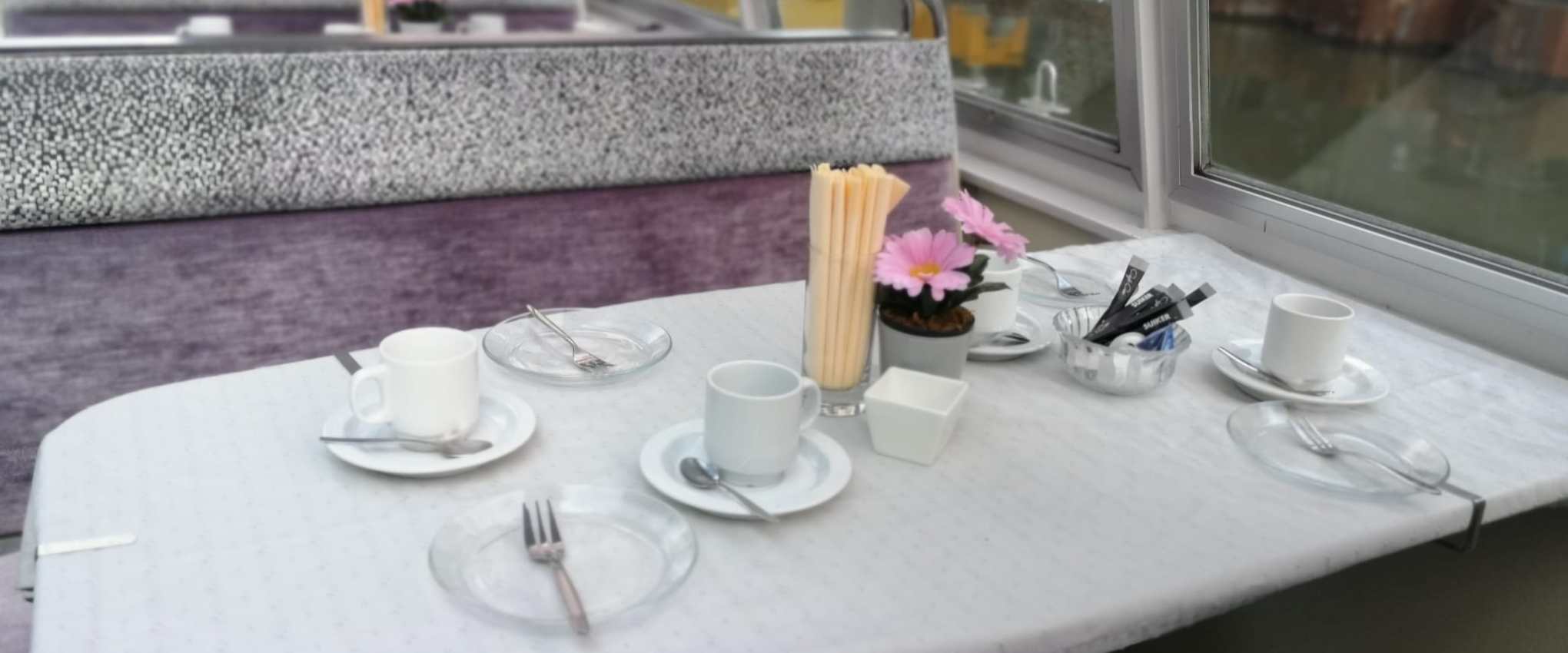 a glass of wine on a table