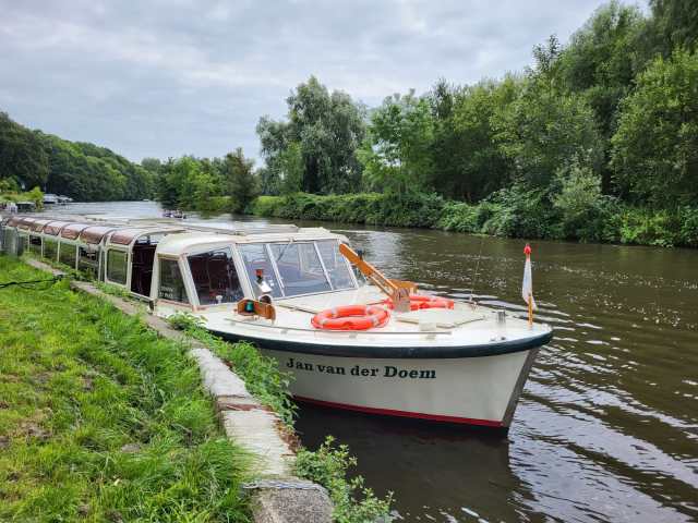 WhatsApp Image 2023-08-10 at 13.34.33 a small boat in a body of water