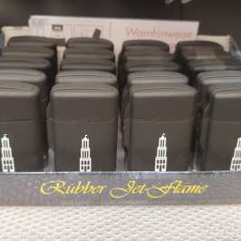 a bunch of luggage sitting on top of a suitcase