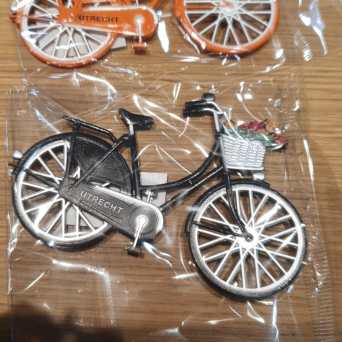 a bicycle parked on the side of a building