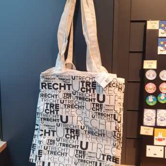 a stack of flyers on a table