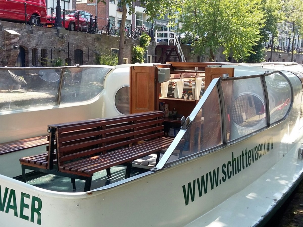 a boat sitting on top of a building