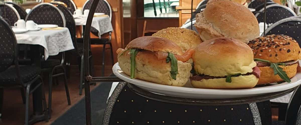 a table topped with plates of food on a plate